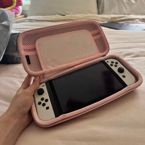 Handheld Gaming Console with Pink Case